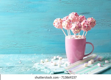 Pink Cake Pops In A Teacup