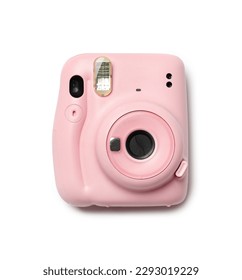 Pink camera isolated on white background top view