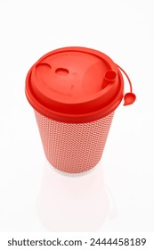 The pink cardboard coffee cup with a red plastic lid on the white glossy background, the inscription on the lid is Carefully Hot, transparent background