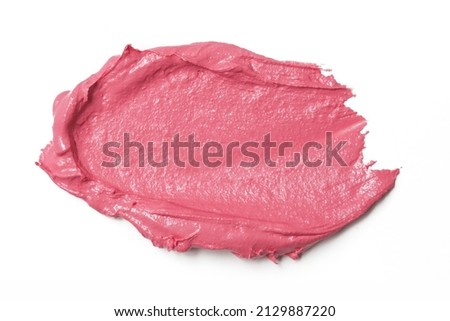 Pink ceamy makeup sample islated on white background. Decorative cosmetic smear.