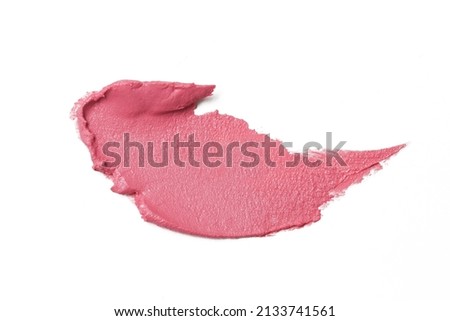 Pink ceamy makeup sample islated on white background. Decorative cosmetic smear.	