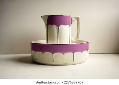 Pink ceramic water basin and jug. Art deco style 1920s. 