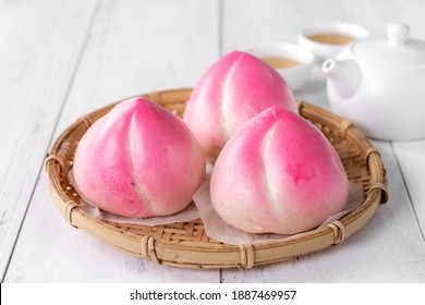 Pink Chinese Peach Birthday Bun Food Named Longevity Peach Shoutao On White Table Background.