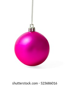 Pink Christmas ball with shadow on white background