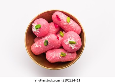 Pink Chumchum or rose flavoured chum chum or cham cham, indian and pakistani sweet - Shutterstock ID 2192224411