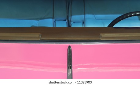 pink classic car with tinted windows - Powered by Shutterstock