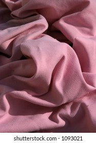 Pink Cloth Table Napkins Clumped Up And Wrinkled For Background Images