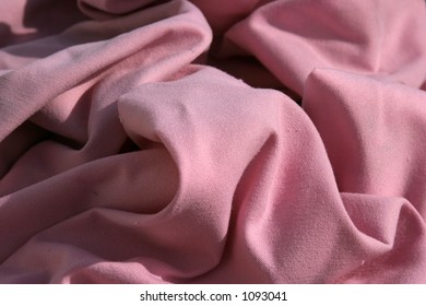 Pink Cloth Table Napkins Clumped Up And Wrinkled For Background Images