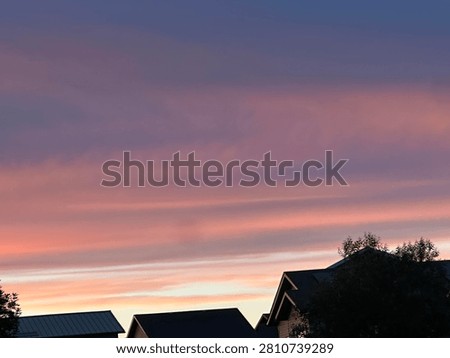 Pink Cloud Patterns in a Peaceful Sunset Sky Background
