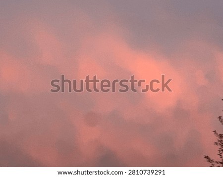 Pink Cloud Patterns in a Peaceful Sunset Sky Background