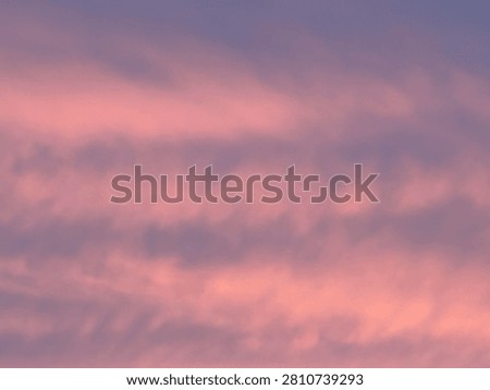 Pink Cloud Patterns in a Peaceful Sunset Sky Background