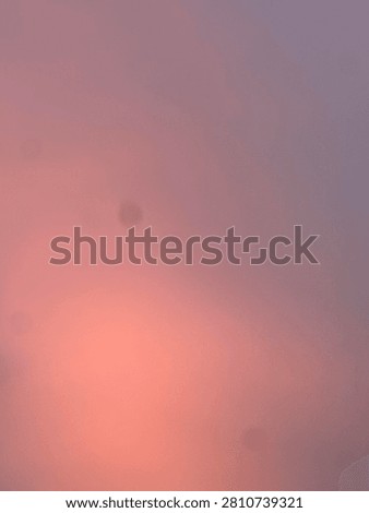Pink Cloud Patterns in a Peaceful Sunset Sky Background