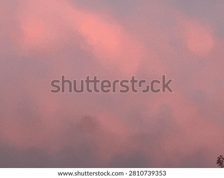 Pink Cloud Patterns in a Peaceful Sunset Sky Background