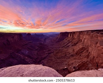 Pink Clouds Illuminate The Sky Above Red Rock Canyons - Powered by Shutterstock