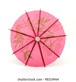 Pink Cocktail Umbrella Isolated On White Background