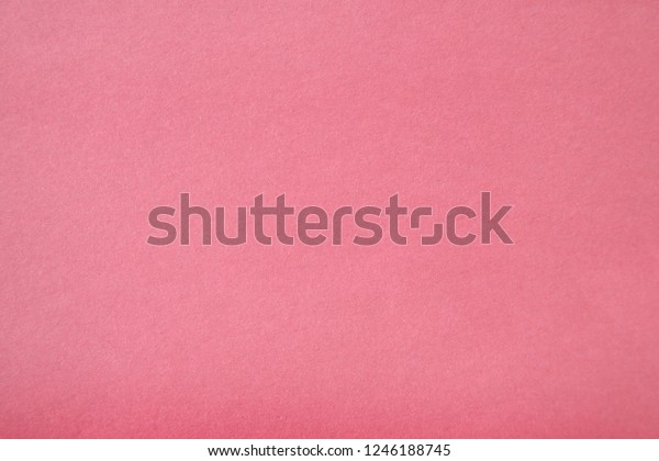 Pink Colored Construction Paper.\
Close up view of Colored Construction Paper. Backgrounds and\
Textures. Opacity filter used to lighten and grade the\
image.\
\
\
