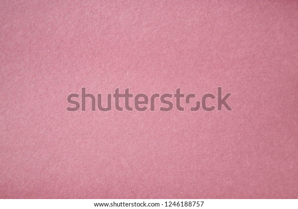 Pink Colored Construction Paper.\
Close up view of Colored Construction Paper. Backgrounds and\
Textures. Opacity filter used to lighten and grade the\
image.\
\
\
