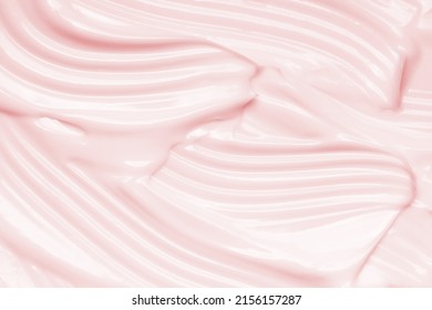 Pink cosmetic cream texture. Face creme, body lotion surface. Skincare creamy product background - Shutterstock ID 2156157287