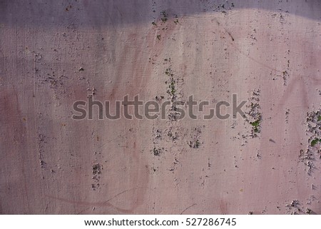 pink cracked paint on metal background