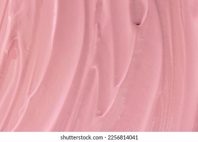 Pink cream or frosting texture close-up