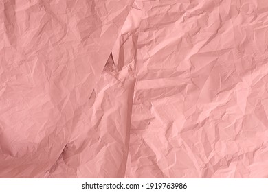 Pink Crumpled Paper Texture Background. 