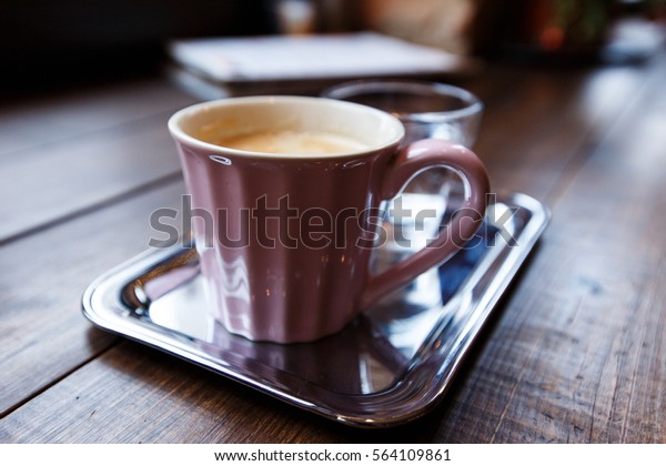 glass and silver coffee cups