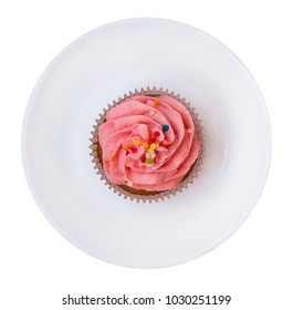 Pink Cupcake On A Plate Isolated On White Background. Delicious Cake. Top View.