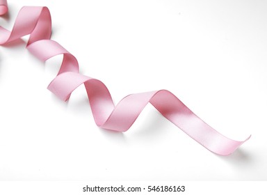 Pink Curly Ribbon Isolated On White