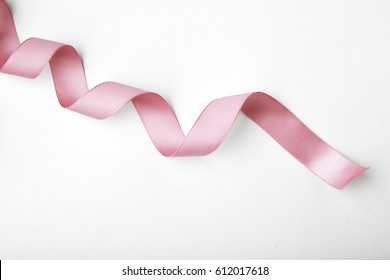 Pink Curly Ribbon Isolated On White