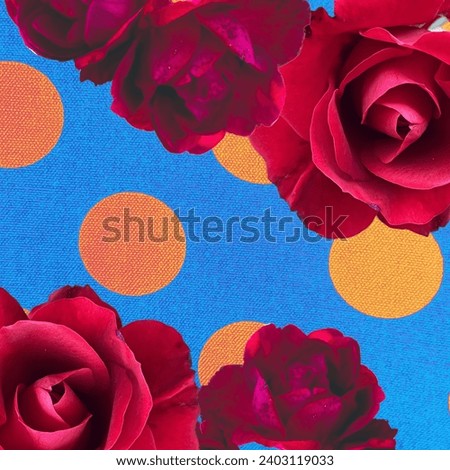 A pink dotty back Red roses