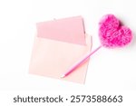 Pink Envelope and Accessories for Creative Customization. Heart-shaped fluffy pen.