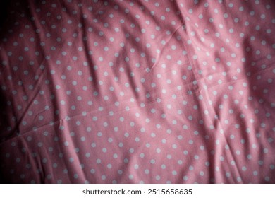 pink fabric texture with dot pattern motive for background