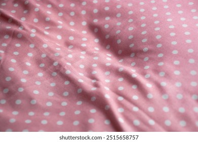 pink fabric texture with dot pattern motive for background