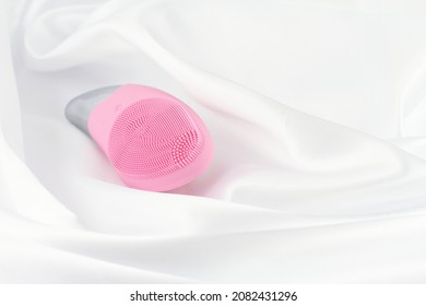 Pink Facial Sonic Brush On White Silk 