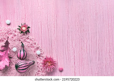 Pink Fall Decor. Panoramic Banner Image. Stripy Pumpkins, Dry Autumn Leaves And Flowers. Fuchsia Painted Objects On Pink Textured Background. Monochromatic Flat Lay, Copy-space.