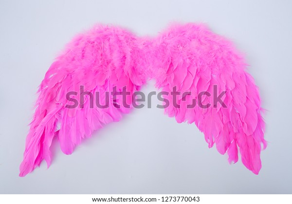 A\
pink fancy angle wing costume on the white background.\
