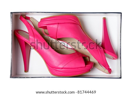 Pink female summer shoes in box isolated on white. With clipping path