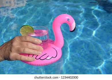 Pink Flamingo Drink Holder Floating In Swimming Pool