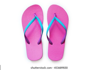 Pink flip flops isolated on white background. Top view