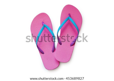 Pink flip flops isolated on white background. Top view