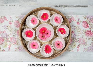 Pink Flower Blossoms On A Tray For Colorful Spring Centerpiece