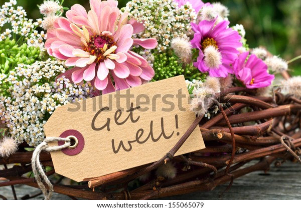 pink flowers and card with lettering get\
well/get well/english
