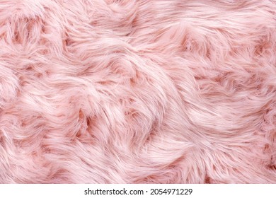 Pink fur texture top view. Pink sheepskin background. Fur pattern. Texture of pink shaggy fur. Wool texture. Sheep fur close up - Shutterstock ID 2054971229