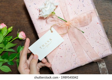 Pink gift box with a card mockup