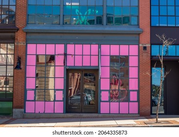 The Pink Glass Wall Of An Office Building In Downtown Denver, Colorado