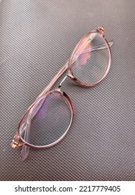 Pink Glasses Object And Plain Brown Background