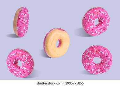 Pink Glazed Donuts Covered With Sugar Crumbs In Gray Background Isolated Close-up. Flat Horizontal View. Donut From Different Sides.