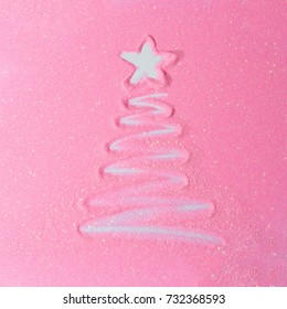 Pink Glitter Background With Christmas Tree. Flat Lay Shiny Texture. New Year Concept.