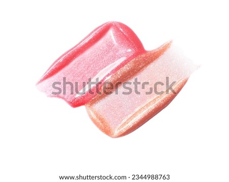 Pink gold lip gloss texture composition isolated on white background. Cosmetic product smear smudge swatch
