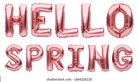 Pink Golden Words HELLO SPRING Made Of Inflatable Balloons Isolated On White Background. Rose Gold Foil Balloon Letters, Party Decorations, Seasonal Celebrating.